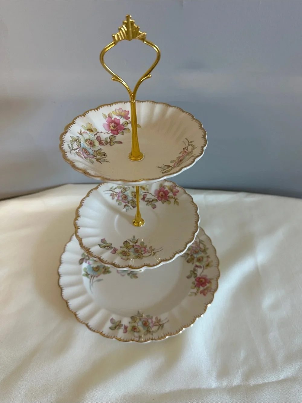 Three-Tier Porcelain Serving Stand with Pink Floral Pattern and Gold Trim